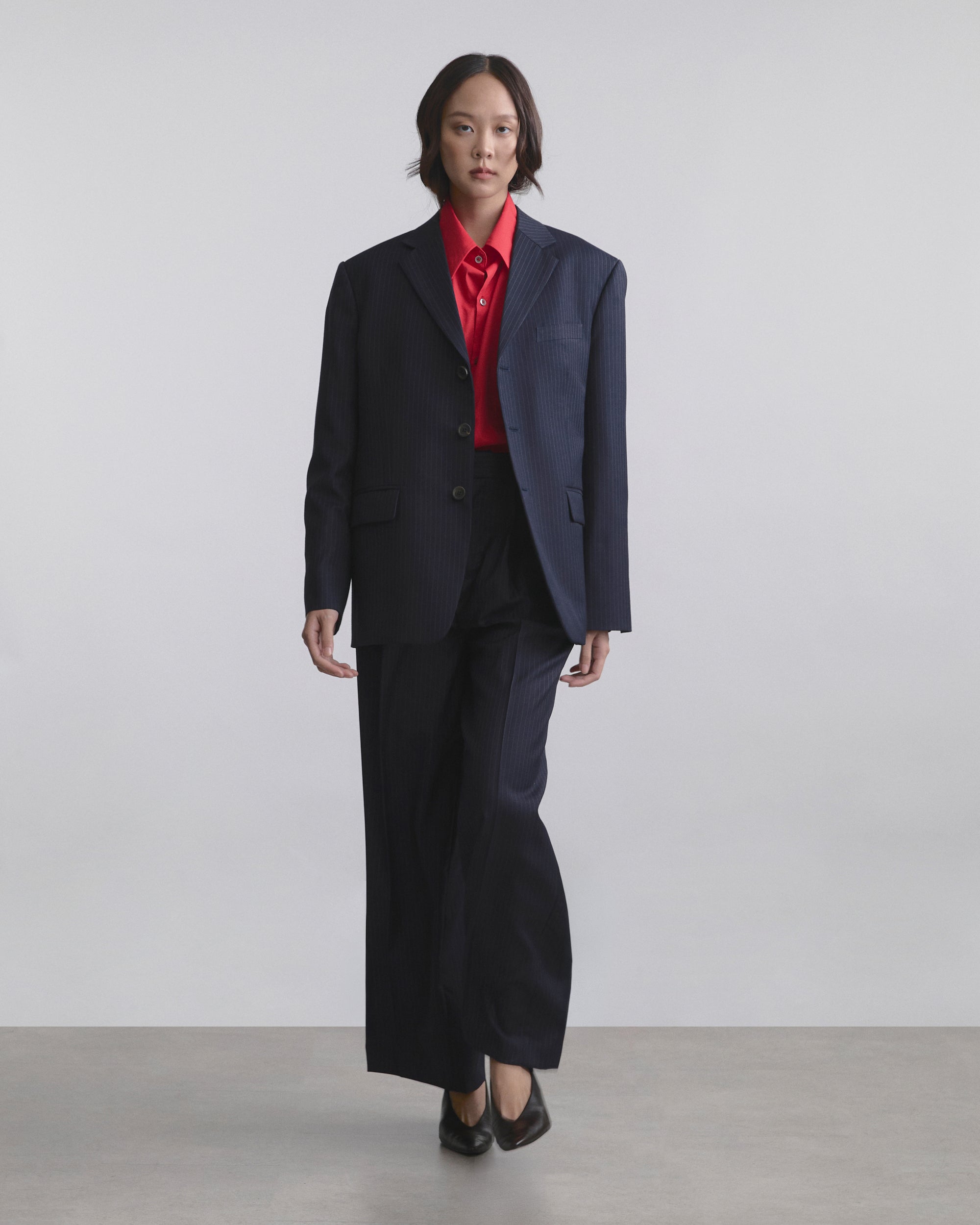 Wardrobe I - AMR Wide-Leg Single-Pleated Trousers in Navy Blue Stripe
